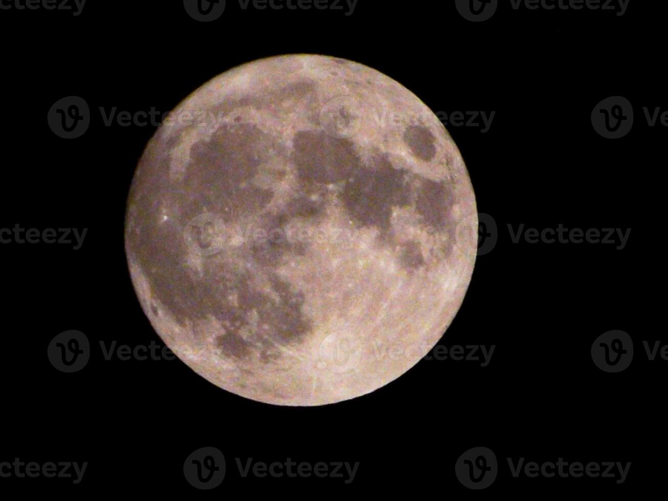 The blue moon in the night sky. supermoon, full moon. photo