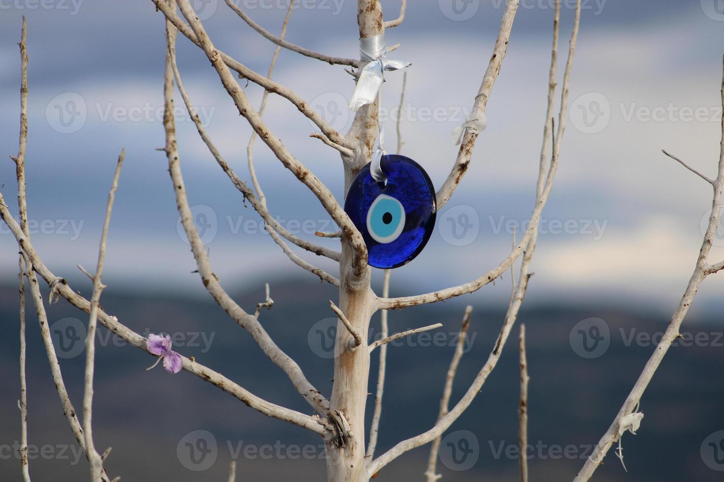 Turkish evil eye bead. blue colored amulet. superstition photo