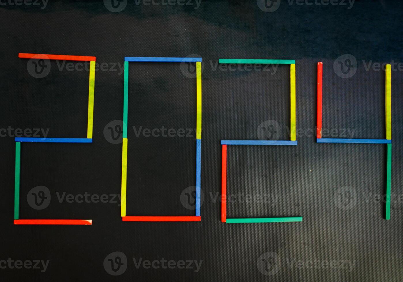 Happy New Year 2024 Idea. Transition from 2023 to new year 2024 concept with text on wooden blocks. Creative Concept. photo