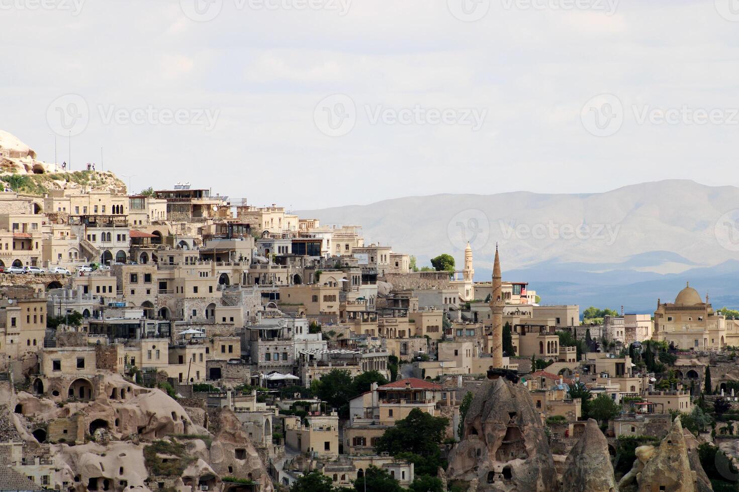 Cappadocia Uhisar Castle is a magnificent view at sunset. Nevsehir,Turkey. photo