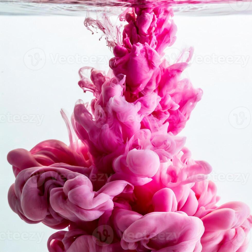 Ink in water isolated on white background. Rainbow of colors photo