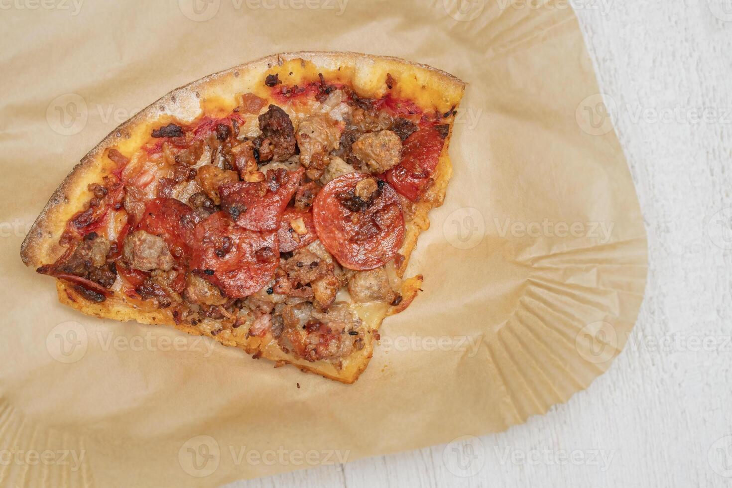 Slice of Meat Lovers Pizza photo