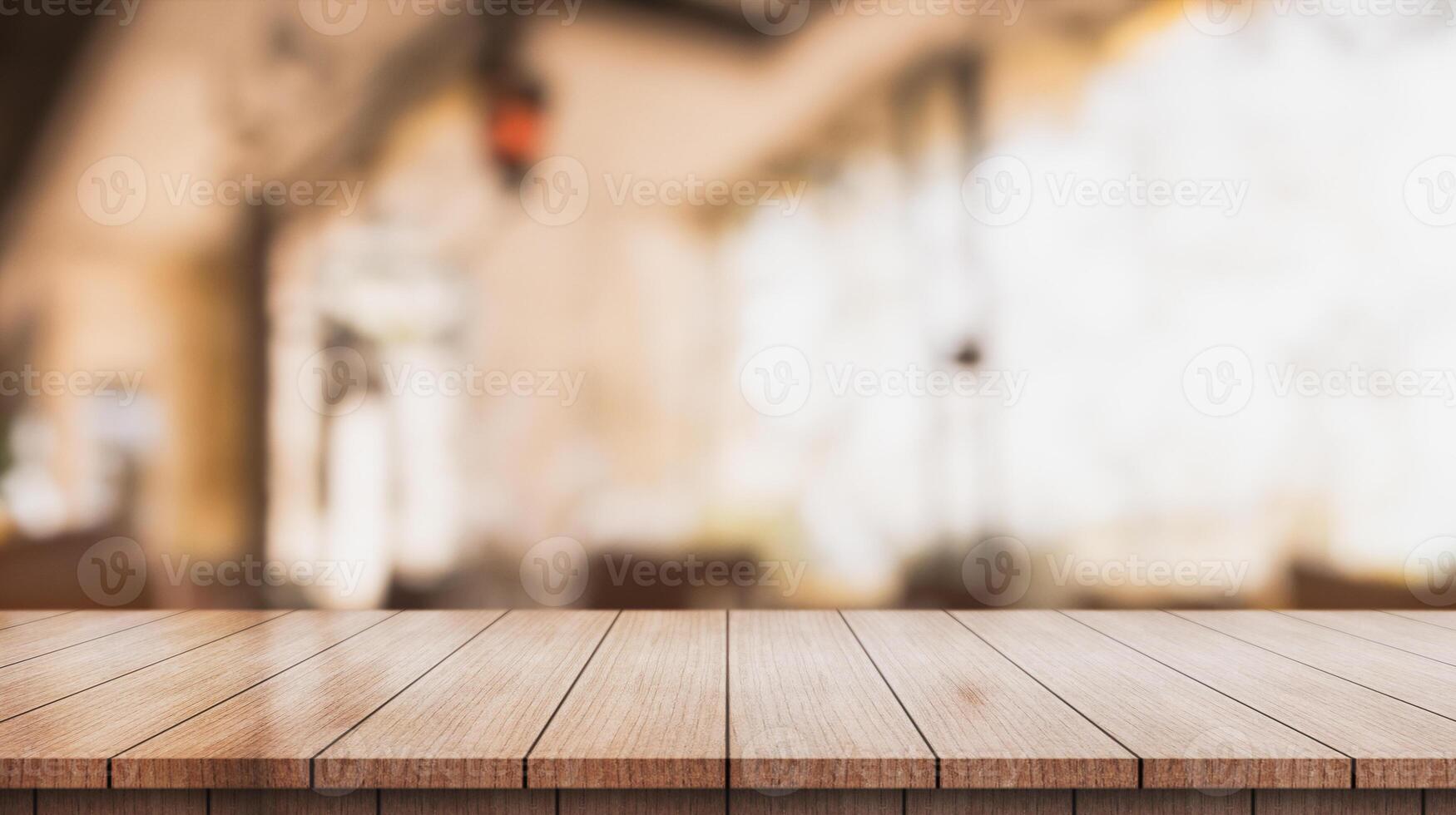 Empty wooden table top with lights bokeh on blur restaurant background. photo