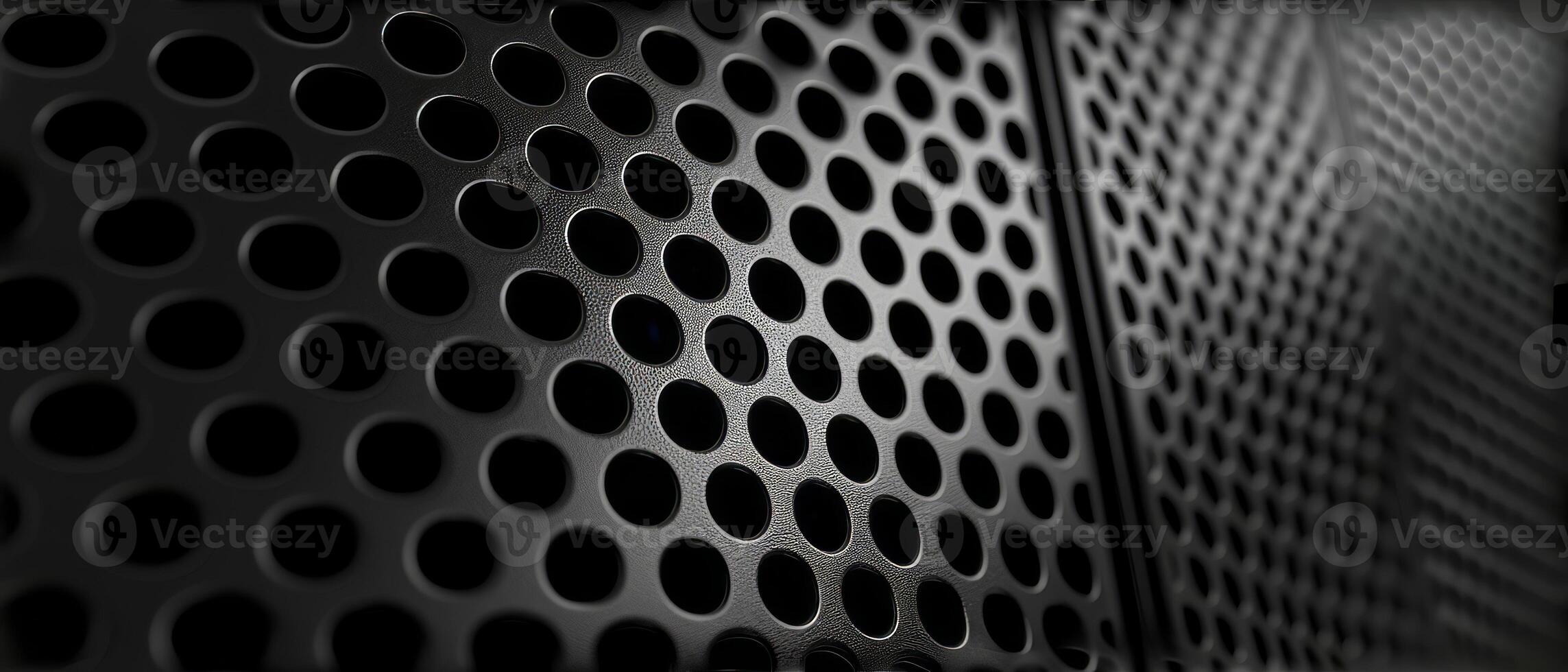 AI generated Macro shot of a black perforated metal surface with circular patterns photo