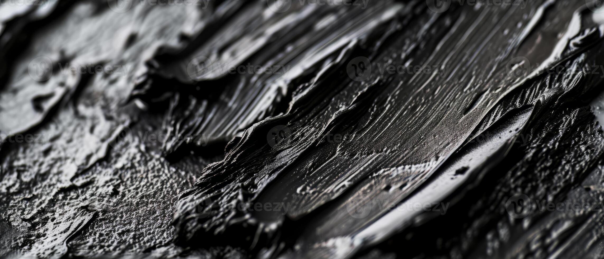 AI generated A detailed close-up of a textured black brush stroke with a glossy finish photo