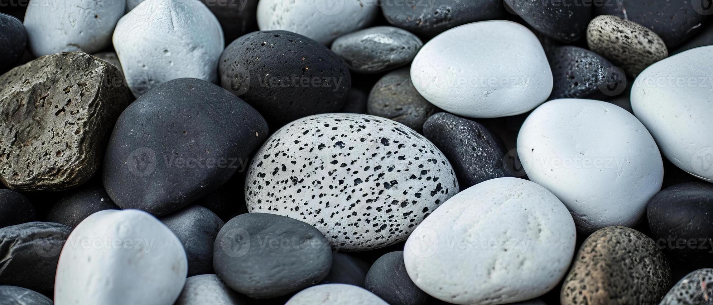 AI generated Contrasting black, white, and speckled pebbles create a natural monochrome mosaic photo