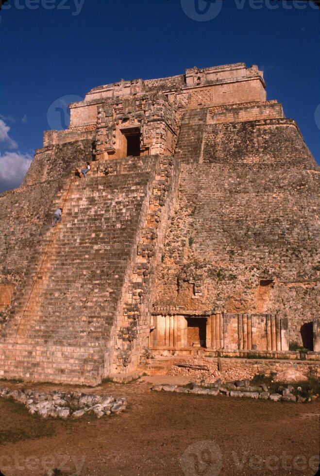 Temple of the Magician at the Maya ruins of Uxmal in the Puuc hills of Yucatan, Mexico. photo