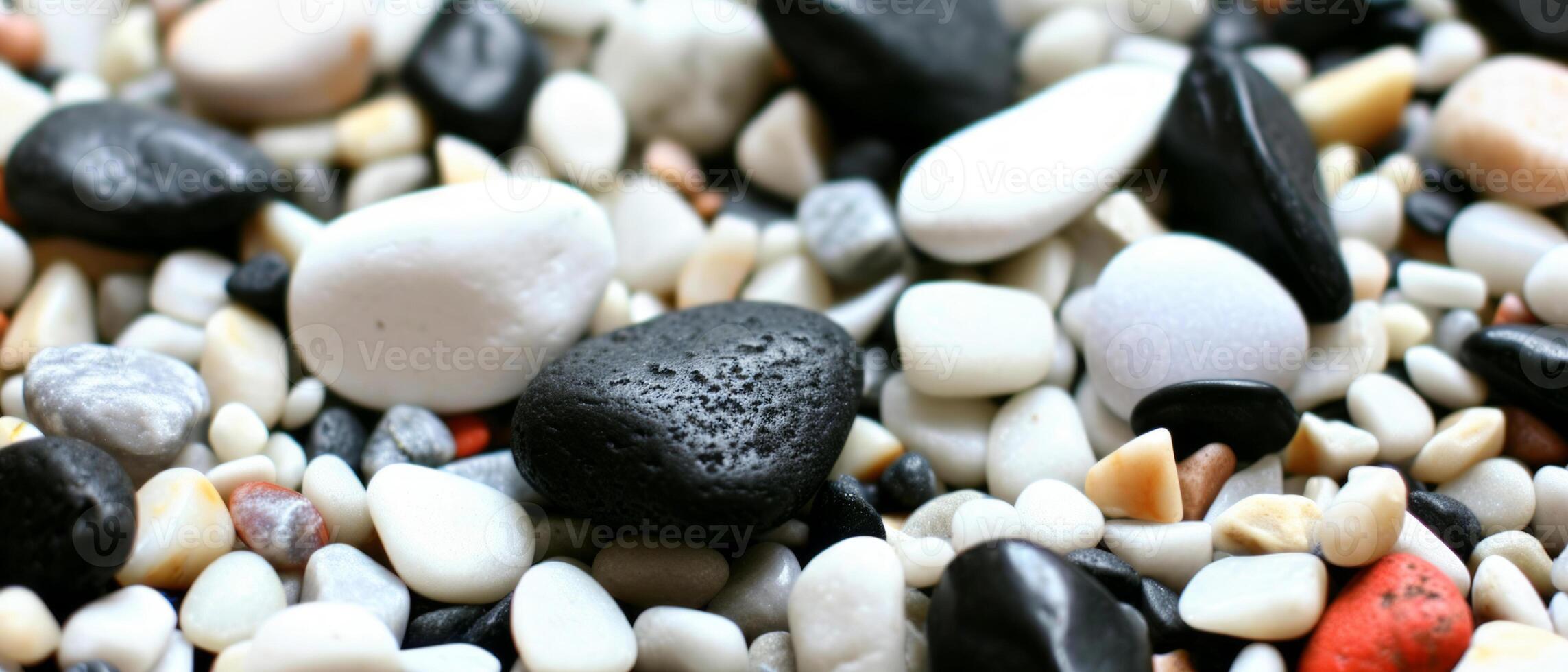 AI generated An array of smooth black and white pebbles close up photo