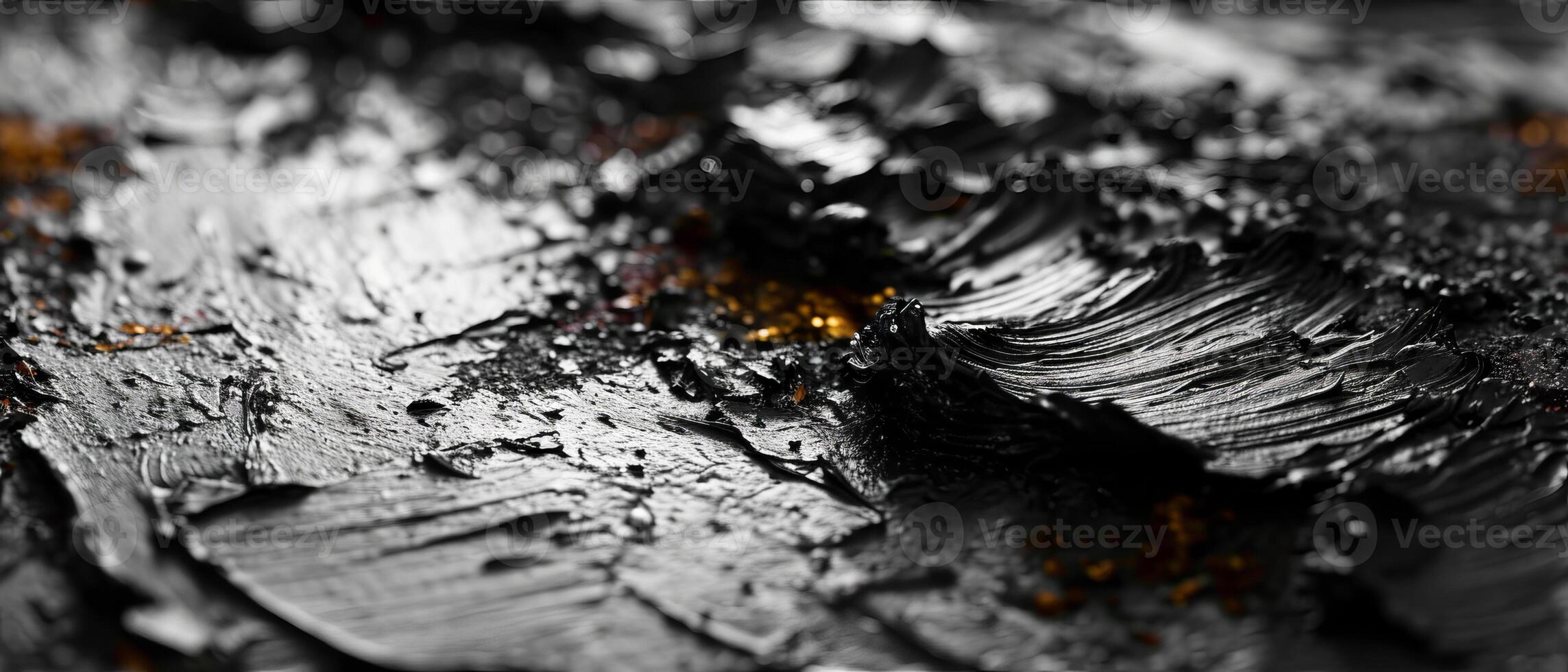 AI generated Macro photography of textured black paint with hints of orange photo