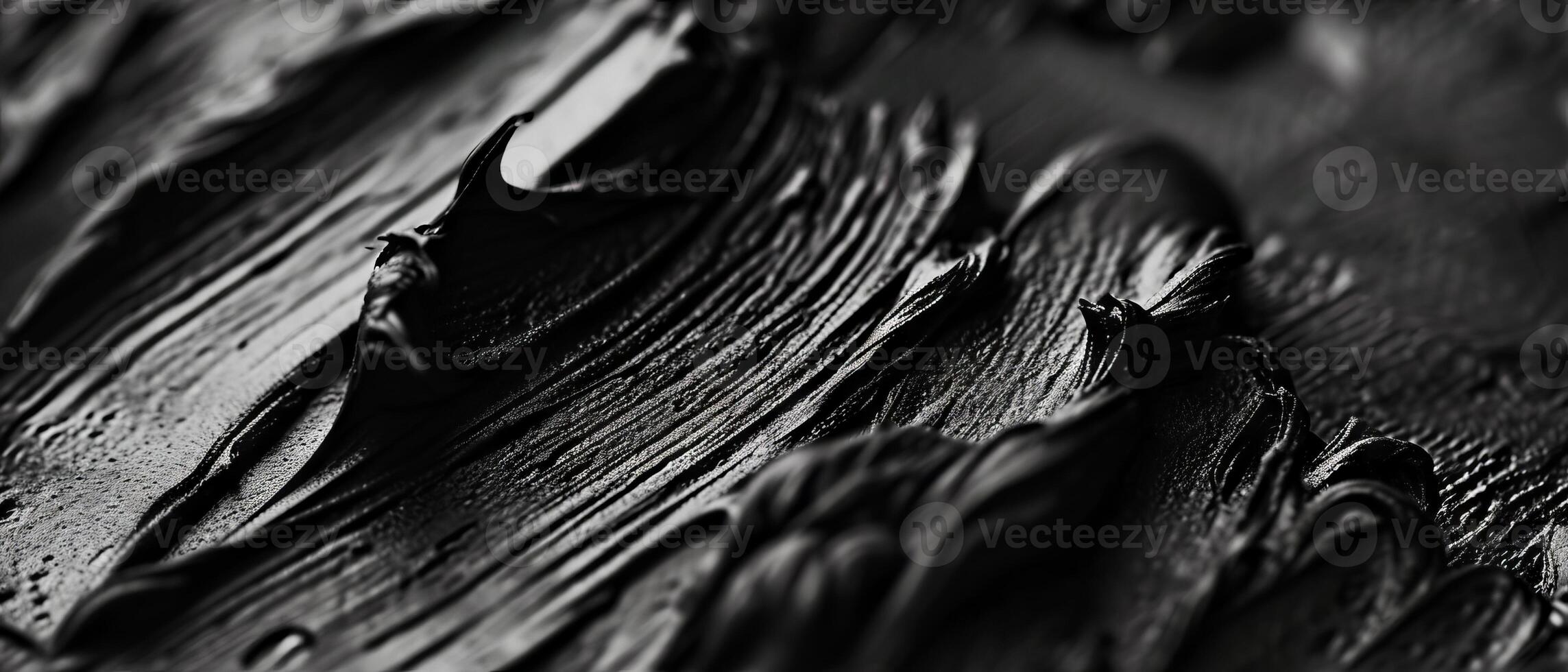 AI generated Close-up of textured black brush strokes on a surface photo