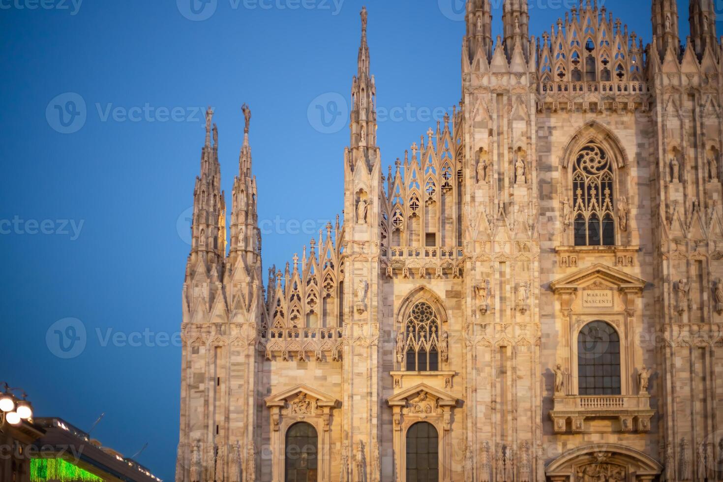 Christmas holiday tree near the Duomo in Milan. Piazza del Duomo. Duomo square in december, night view photo