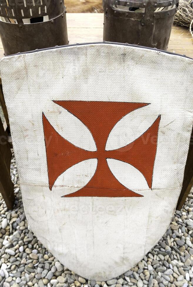 Medieval shield with cross photo