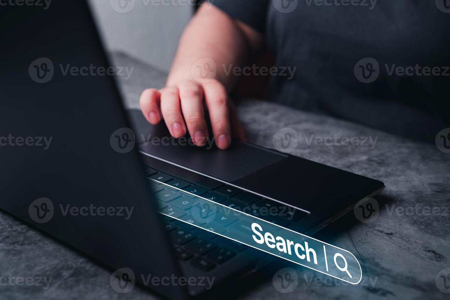 Woman use laptop with VR search bar. SEO. Browser technology. Concept of searching on internet with copy space. photo