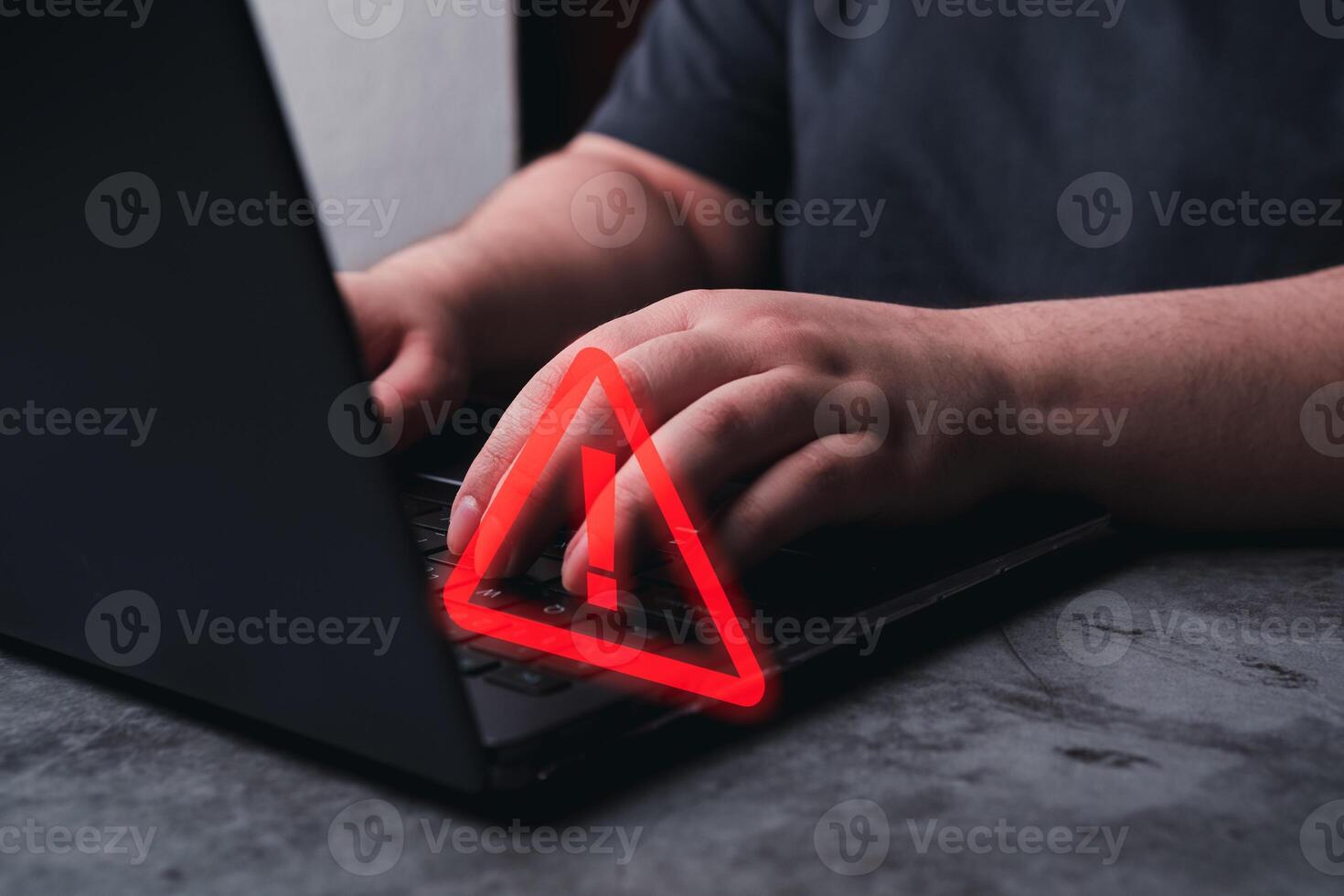 Woman use laptop with hologram warning sign for notification error. Programmer, developer and maintenance system concept. Scam virus attack. Security protection. photo