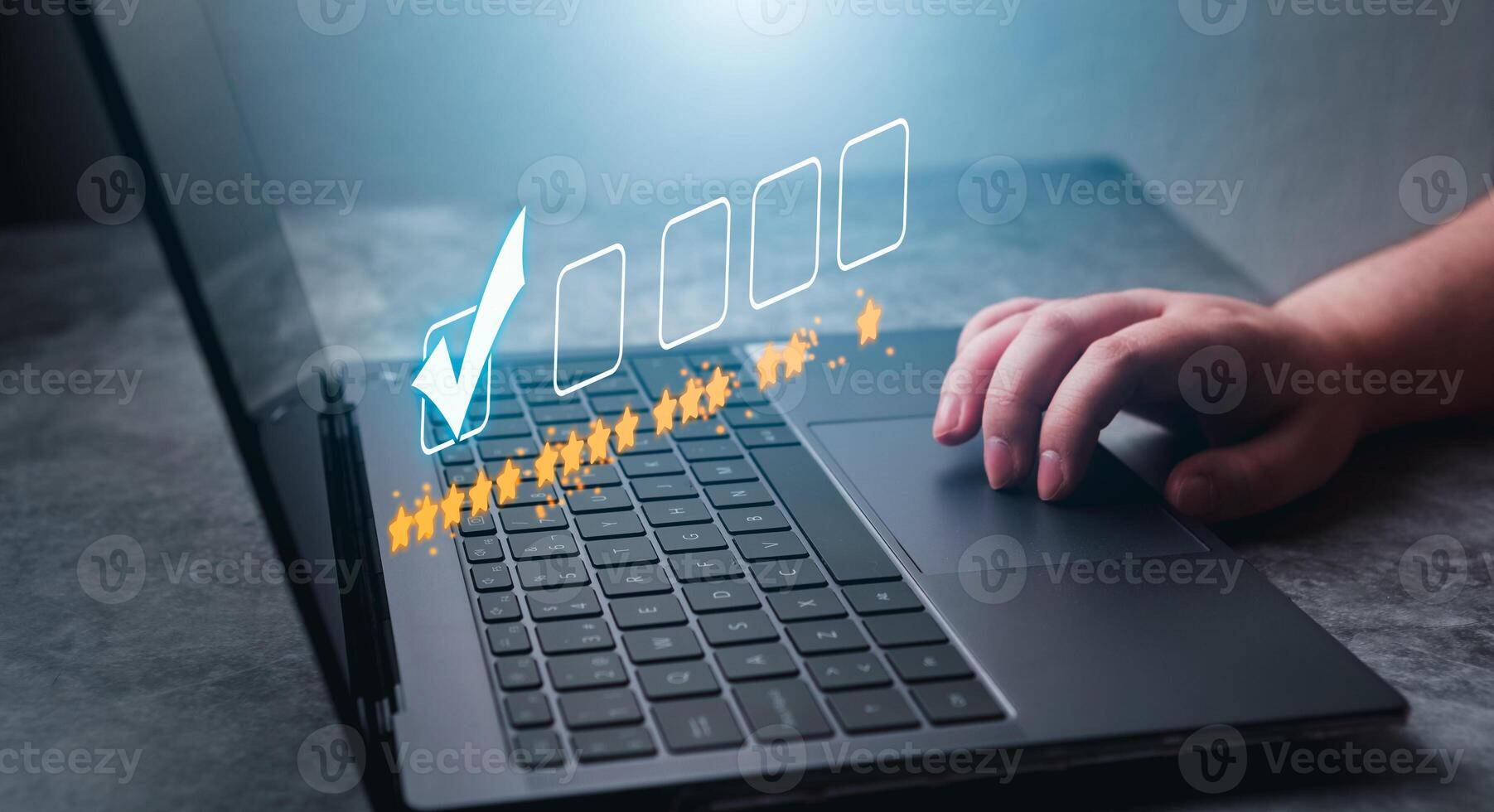 Woman use laptop to rate a service online. Customer review concept. Business rating experience. Satisfaction survey concept. 5 stars satisfaction. photo