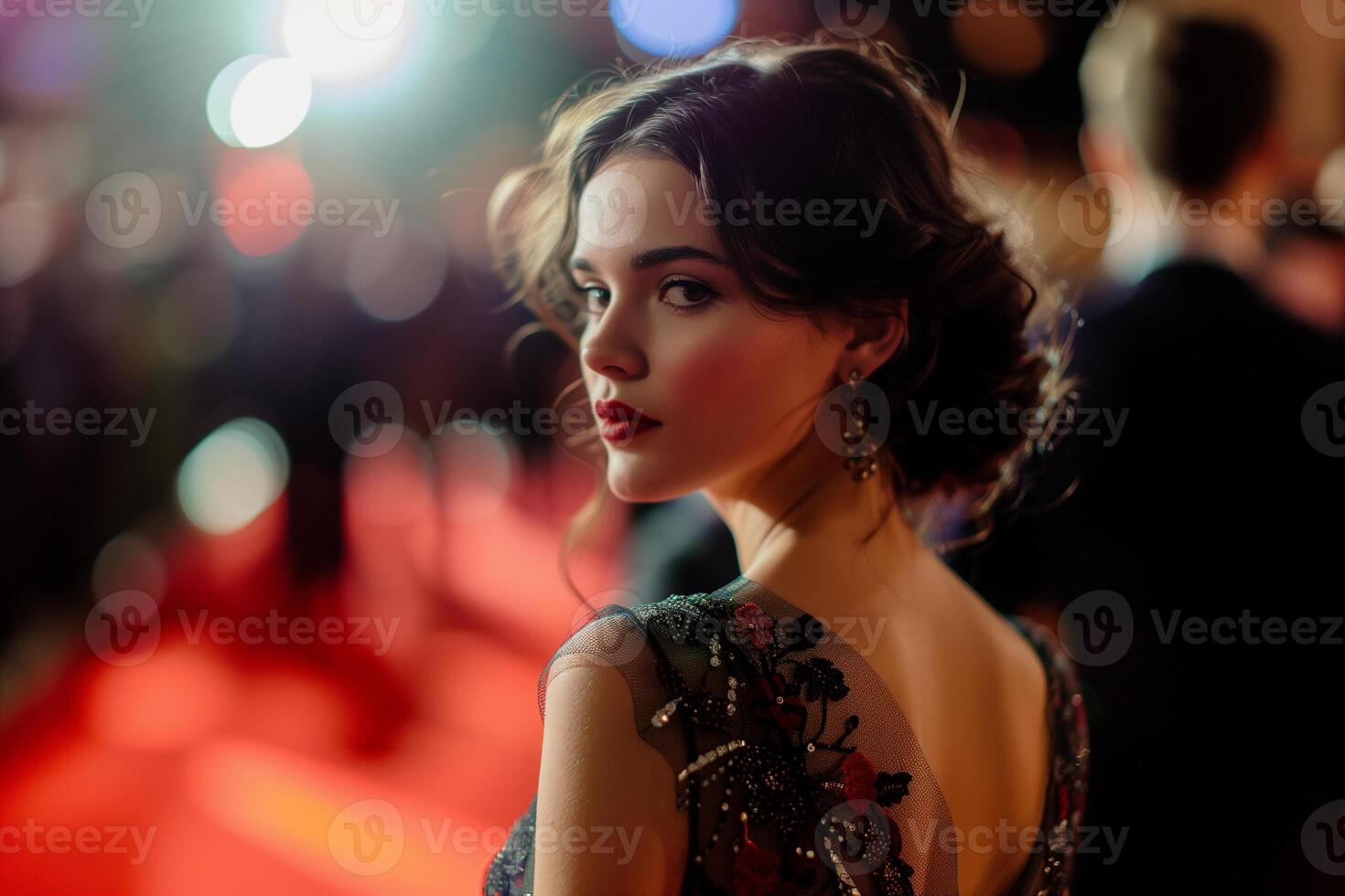AI generated a lady attending a event with a red carpet and a crowd in the background photo