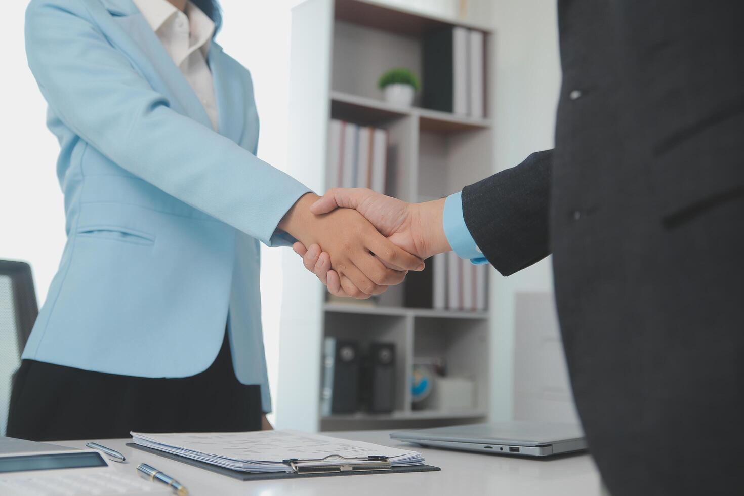 Close up view of job interview in office, focus on resume writing tips, employer reviewing good cv of prepared skilled applicant, recruiter considering application, hr manager making hiring decision photo