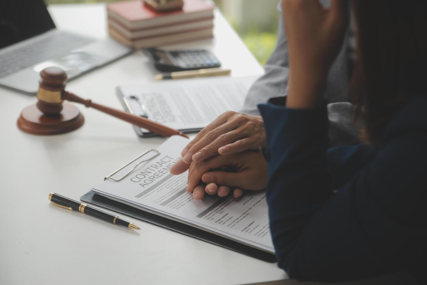 Lawyer, legal advisor, businessman brainstorming information on agreement details Business contracts in legal processing books for accuracy in contract documents. joint financial investment. photo