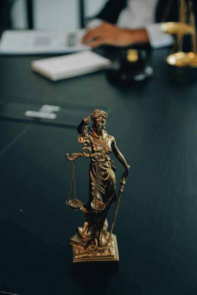 Judge gavel with Justice lawyers having team meeting at law firm background. Concepts of Law and Legal services. photo