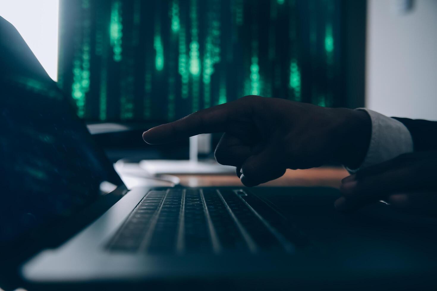 Hacker code in laptop. Cyber security, privacy or hack threat. Coder or programmer writing virus software, malware, internet attack or developing digital design. Green web data in computer screen. photo