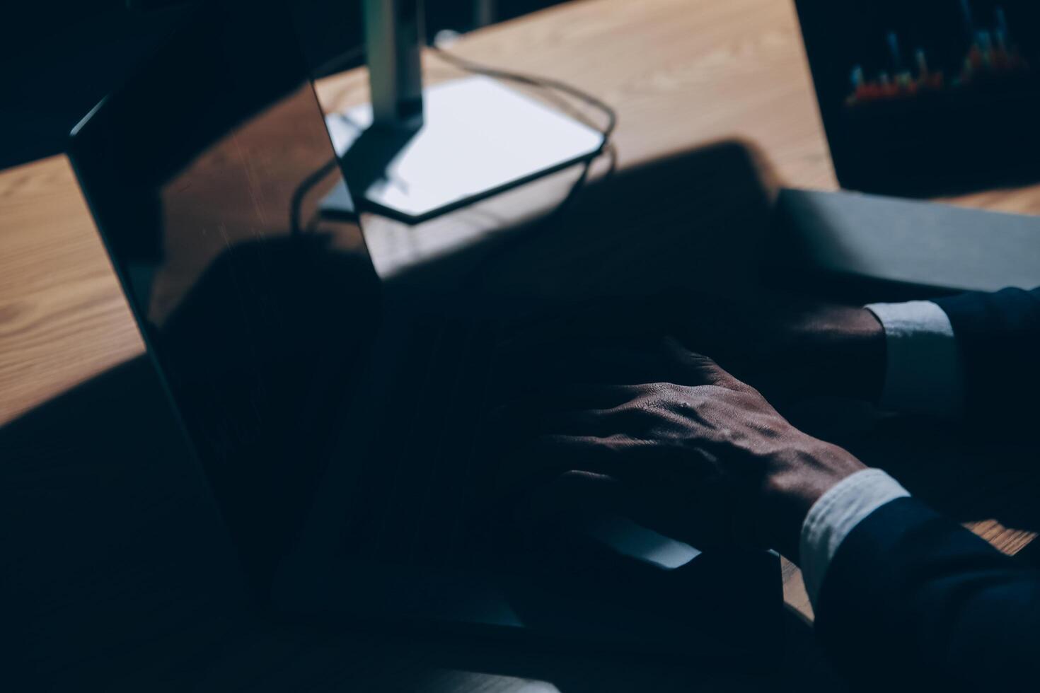 Thoughtful focused successful caucasian male stock investor, broker, financial adviser, sits at work desk, looks at computer, pensively analyze risks and prospects, rise or fall of cryptocurrency coin photo