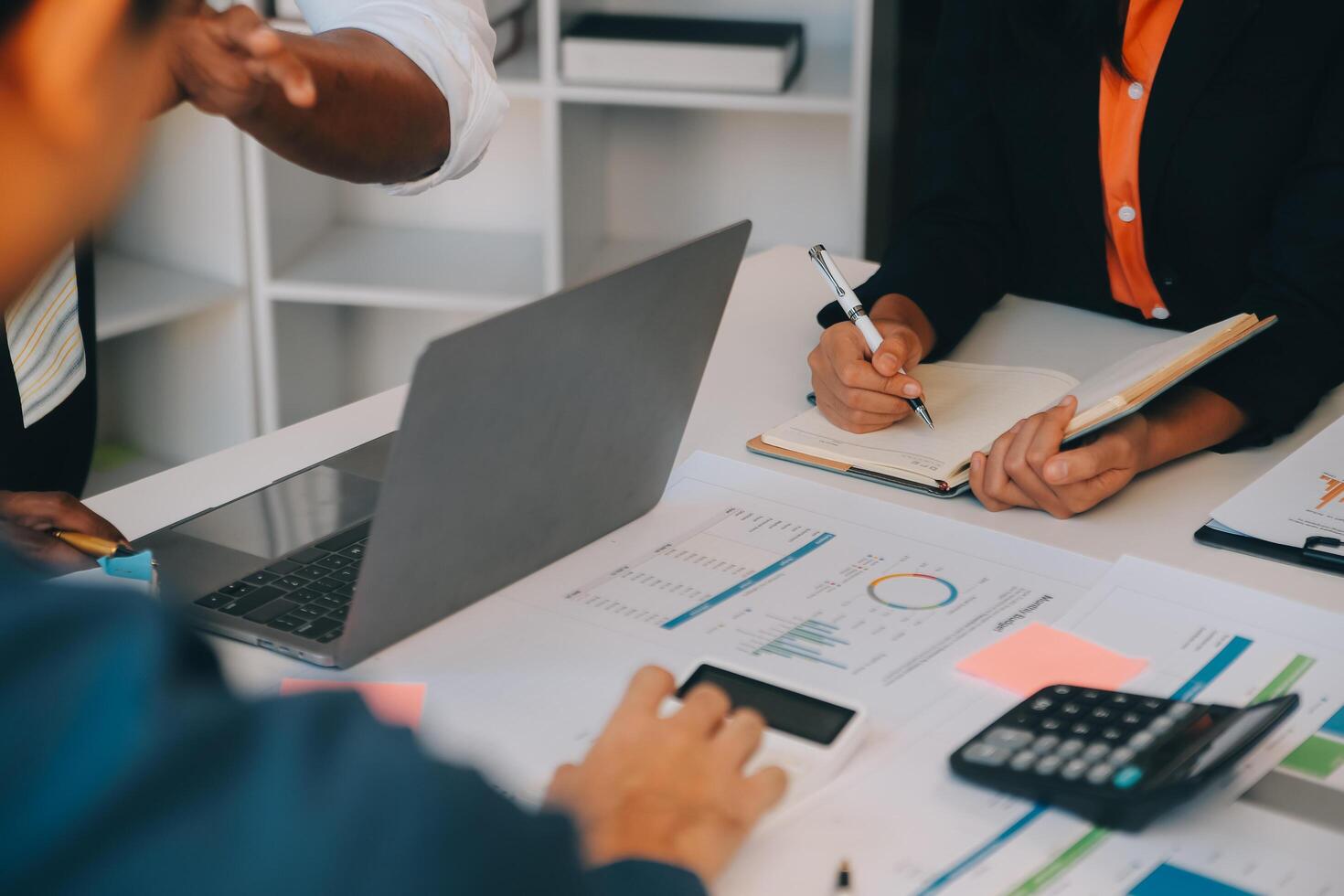 Co working conference, Business team meeting present, investor colleagues discussing new plan financial graph data on office table with laptop and digital tablet, Finance, accounting, investment. photo