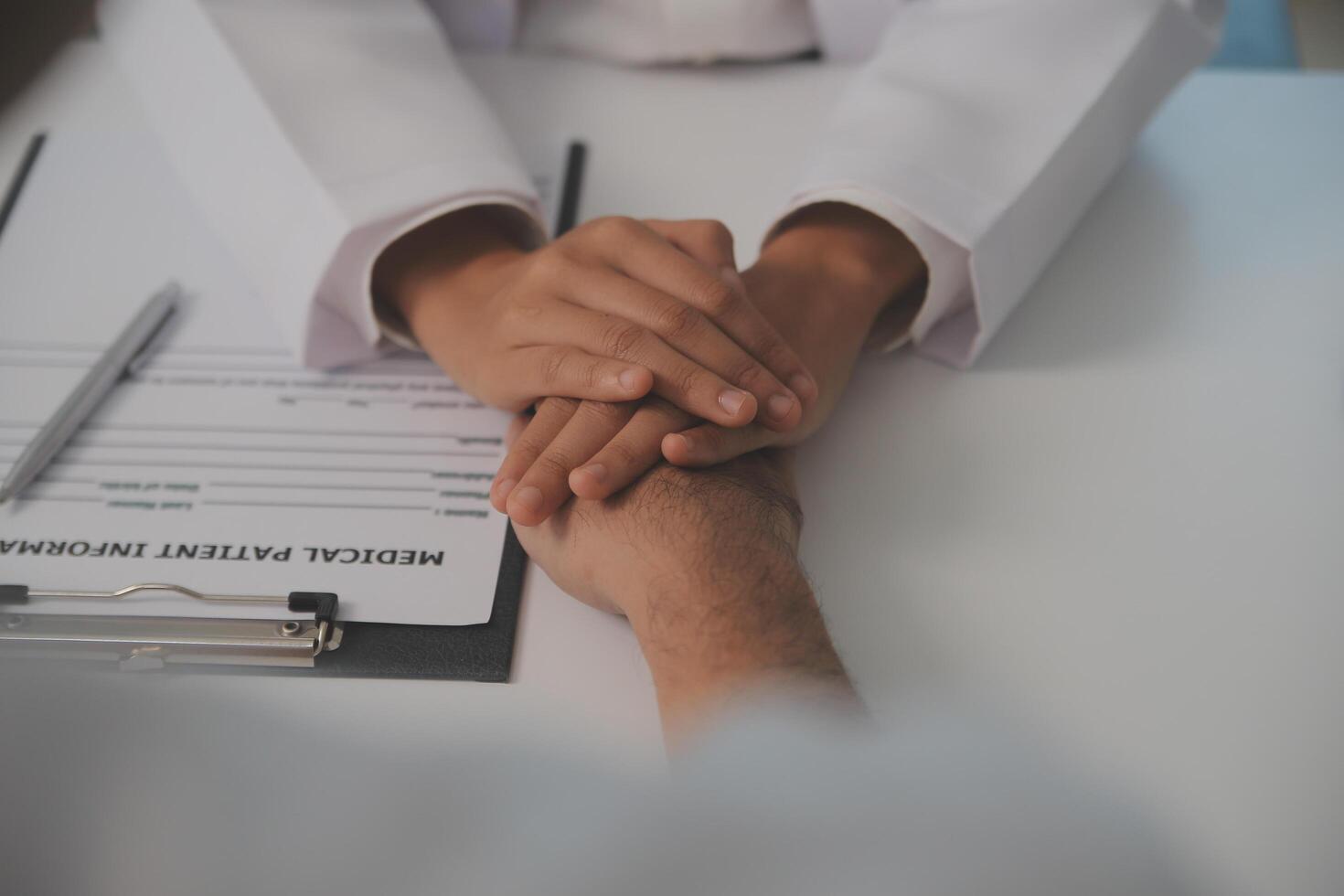 Homecare nursing service and elderly people cardiology healthcare. Close up of young hispanic female doctor nurse check mature caucasian man patient heartbeat using stethoscope during visit photo