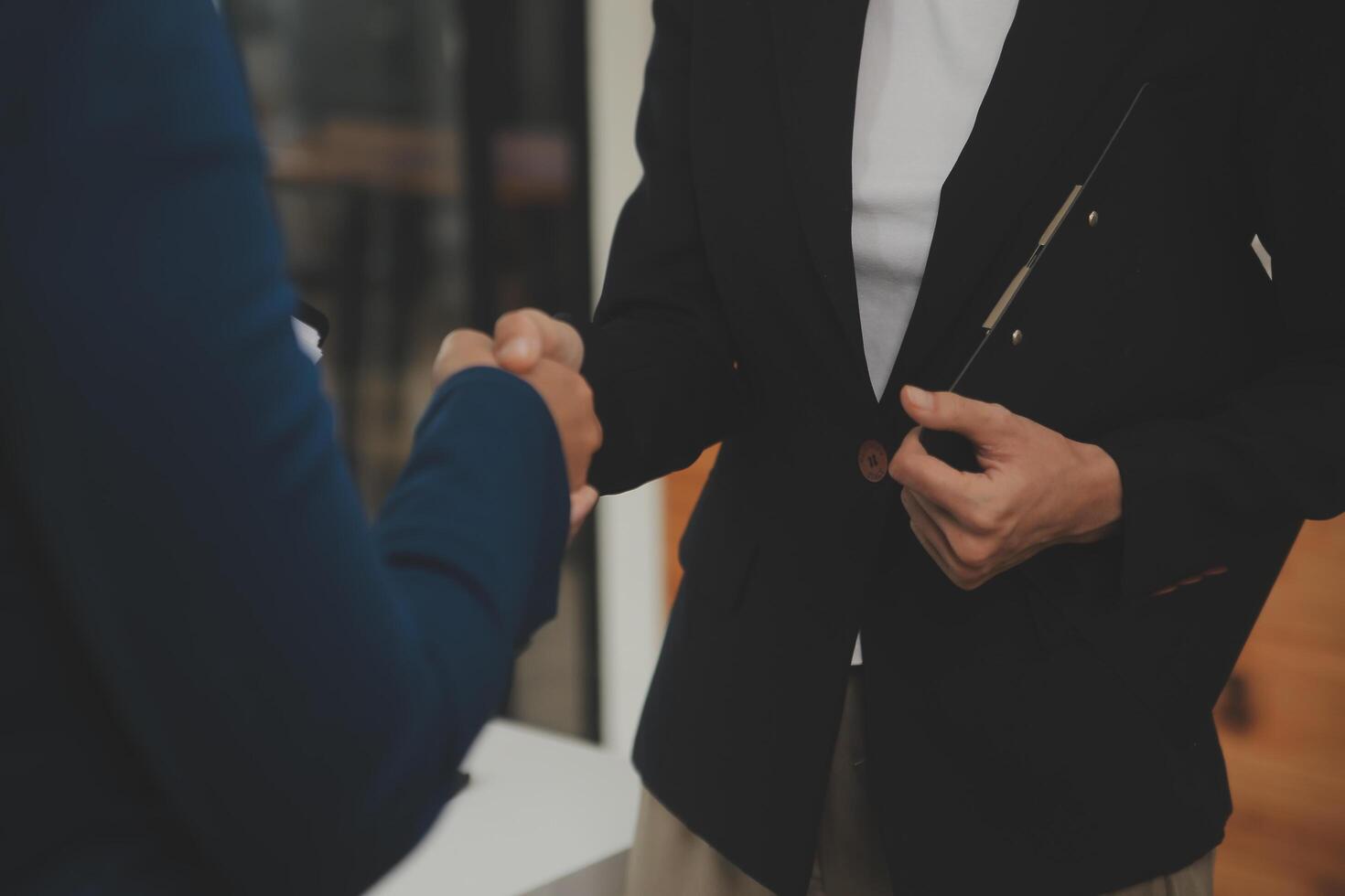 Business handshake for teamwork of business merger and acquisition,successful negotiate,hand shake,two businessman shake hand with partner to celebration partnership and business deal concept photo