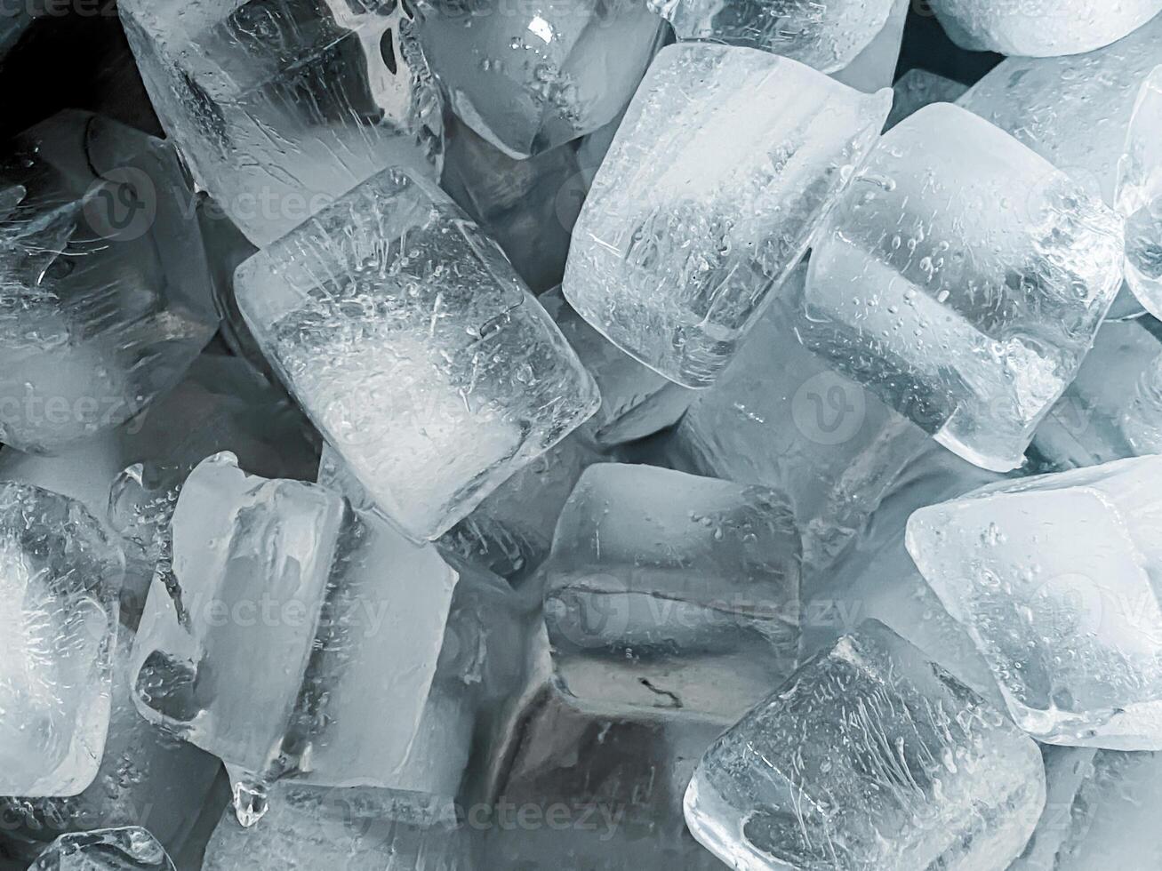 icecubes background,icecubes texture,icecubes wallpaper,ice helps to feel refreshed and cool water from the icecubes helps the water refresh your life and feel good.ice drinks for refreshment business photo