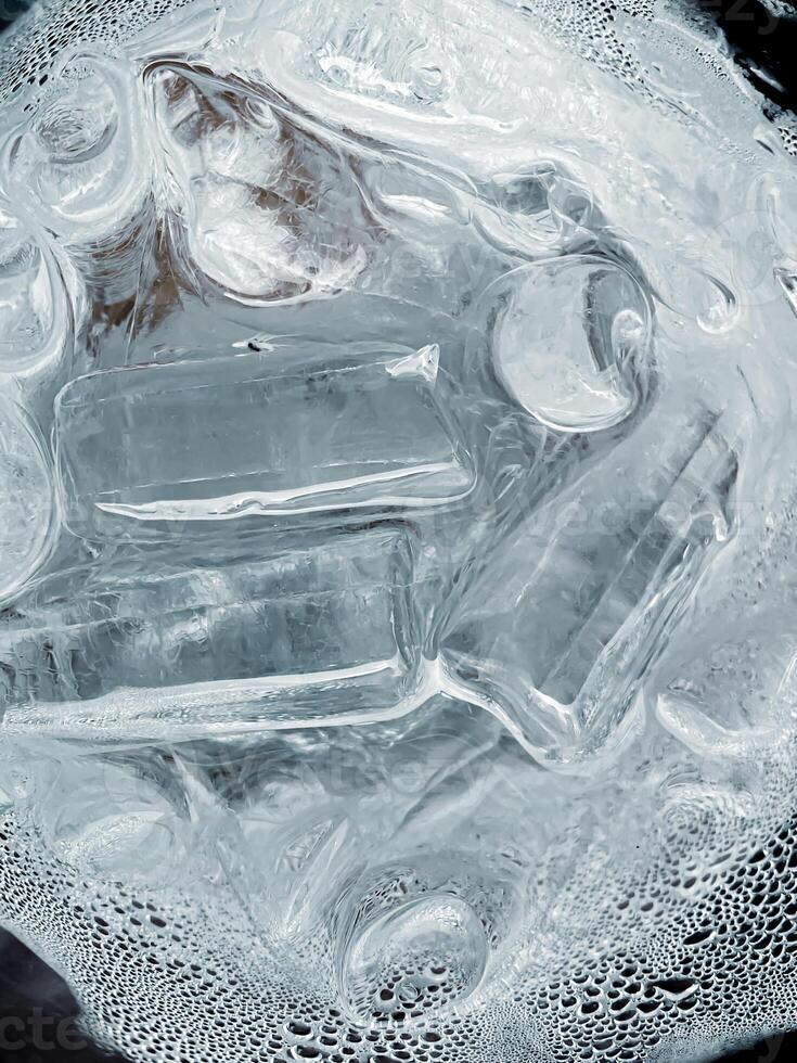 icecubes background,icecubes texture,icecubes wallpaper,ice helps to feel refreshed and cool water from the icecubes helps the water refresh your life and feel good.ice drinks for refreshment business photo