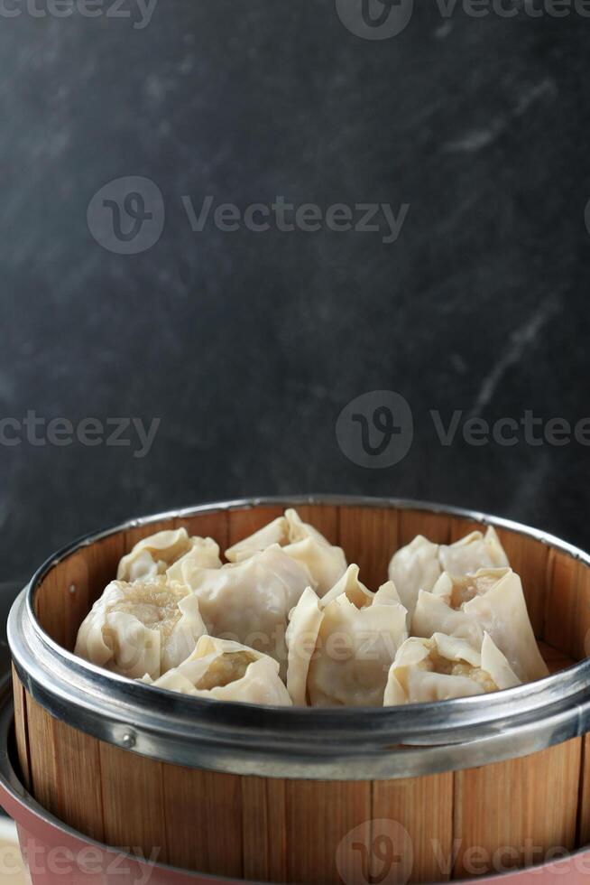 Cooking Process, Steamed Siomay Dumpling or Siew May Ikan photo