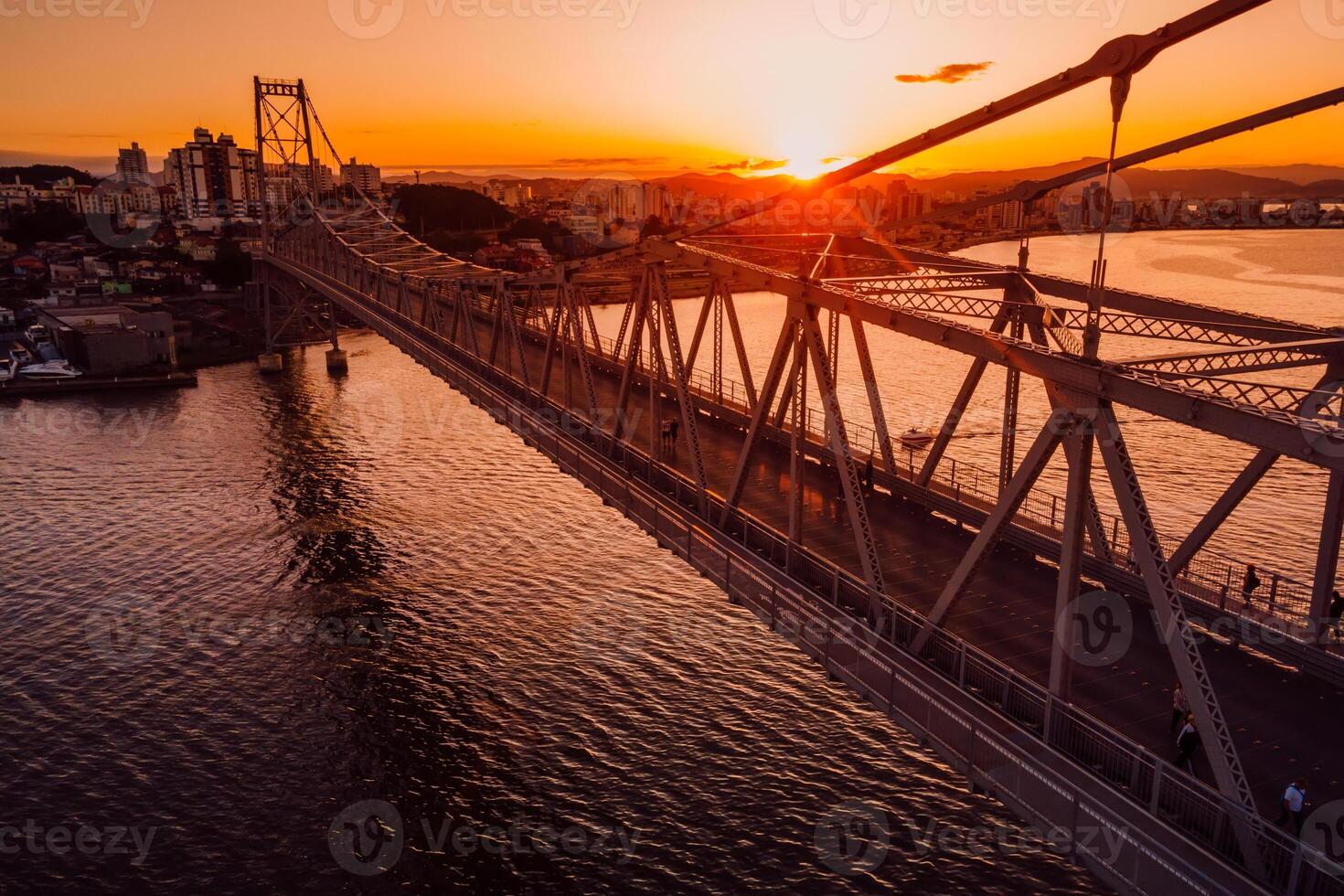 Hercilio luz cable bridge with sunset in Florianopolis, Brazil. Aerial view photo