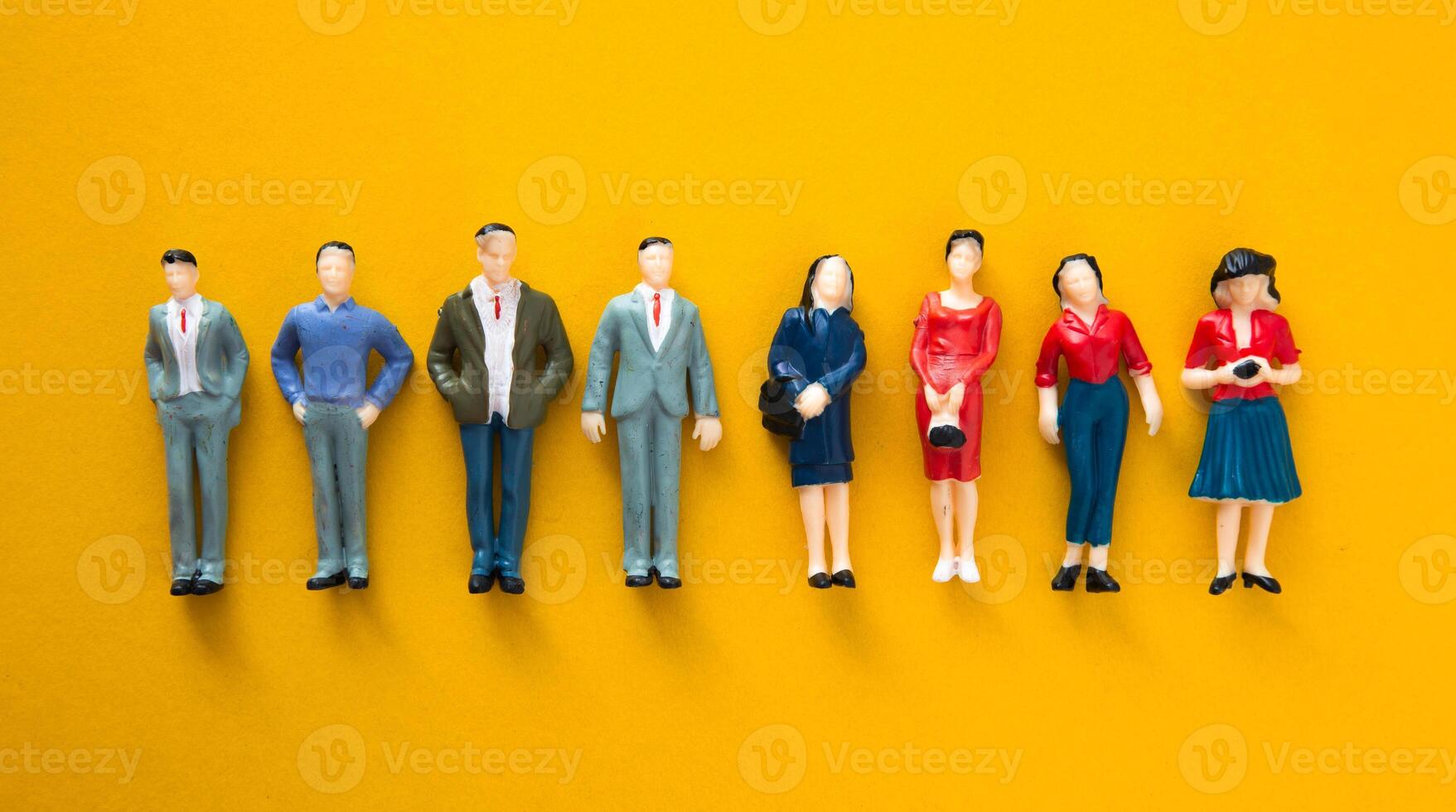 Miniature figure act as a Professional person. photo