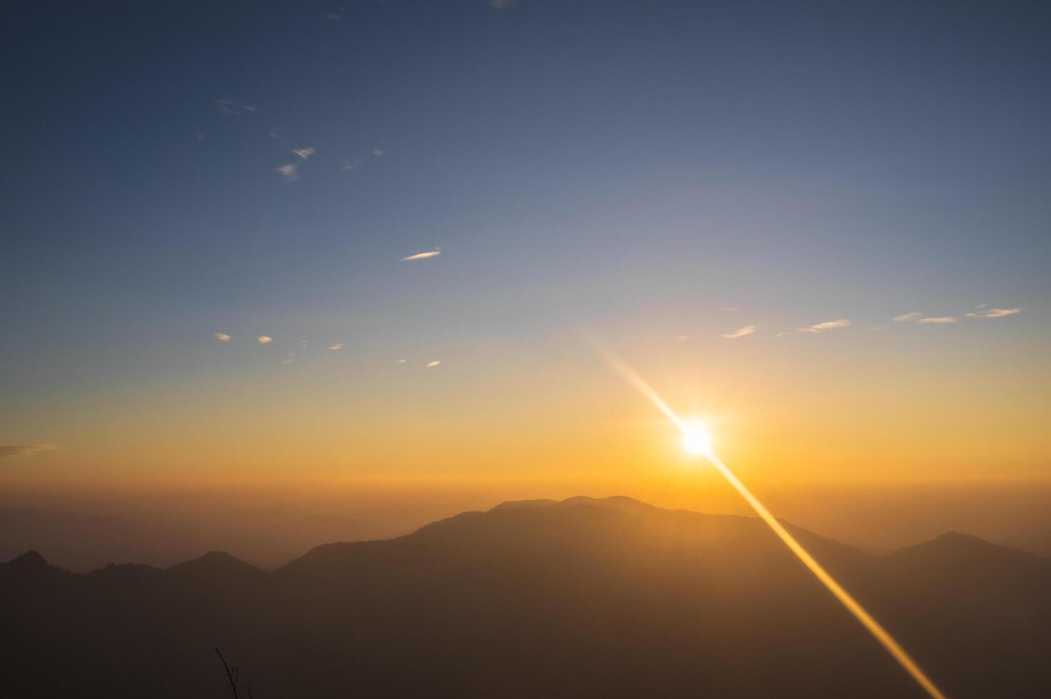 Beautiful sunrise on khao san nok wua kanchanaburi.Khao San Nok Wua is the highest mountain in Khao Laem National Park. It is 1767 meters above sea level. photo