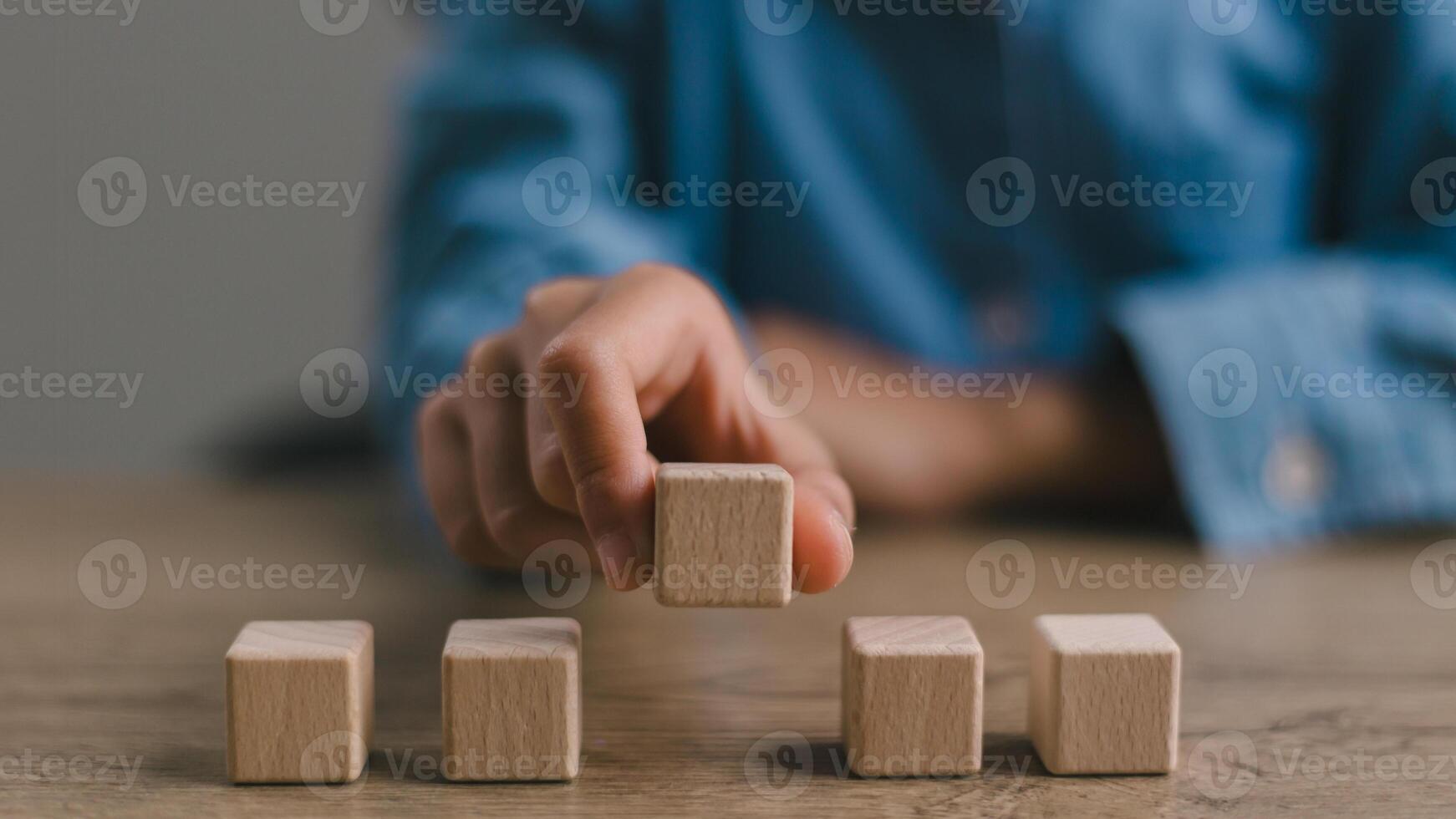 Blank wooden cubes on the table with copy space, empty wooden cubes for input wording, and an infographic icon. photo
