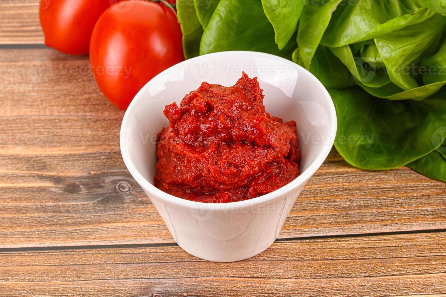 Tomato puree sauce for cooking photo