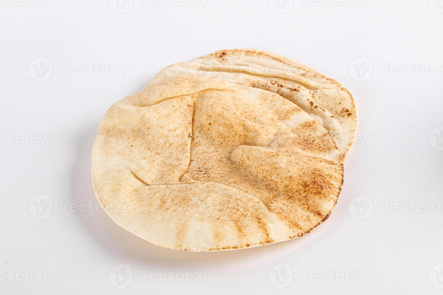 Traditional eastern round pita bread photo