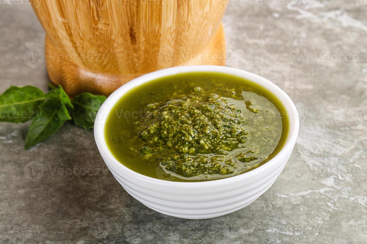 Homemade vegetarian basil pesto sauce photo