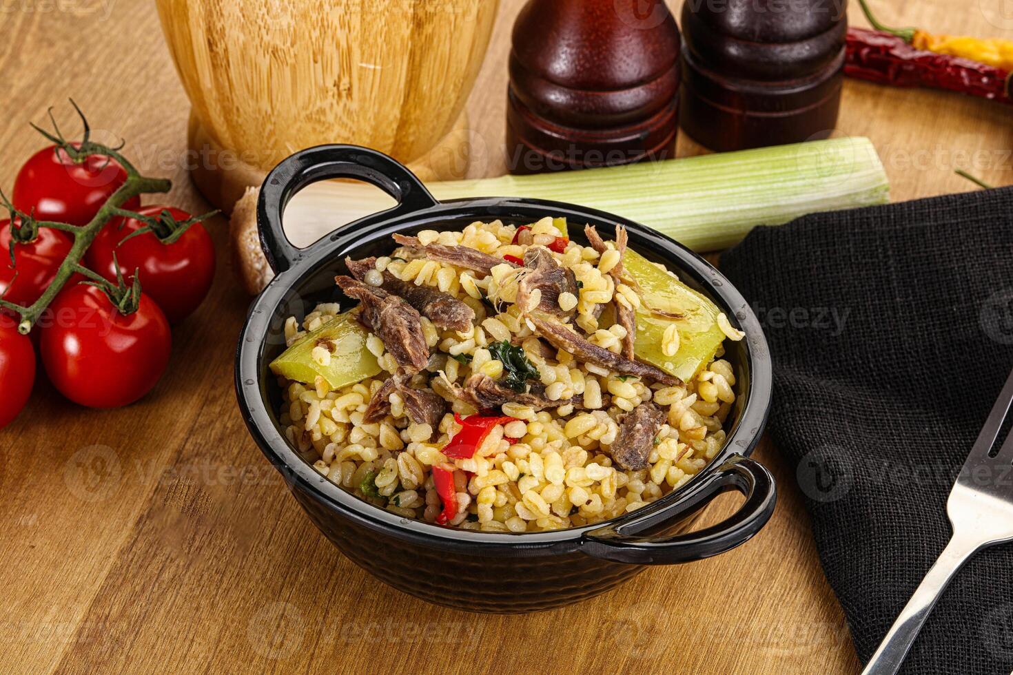 Bulgur with lamb and vegetables photo