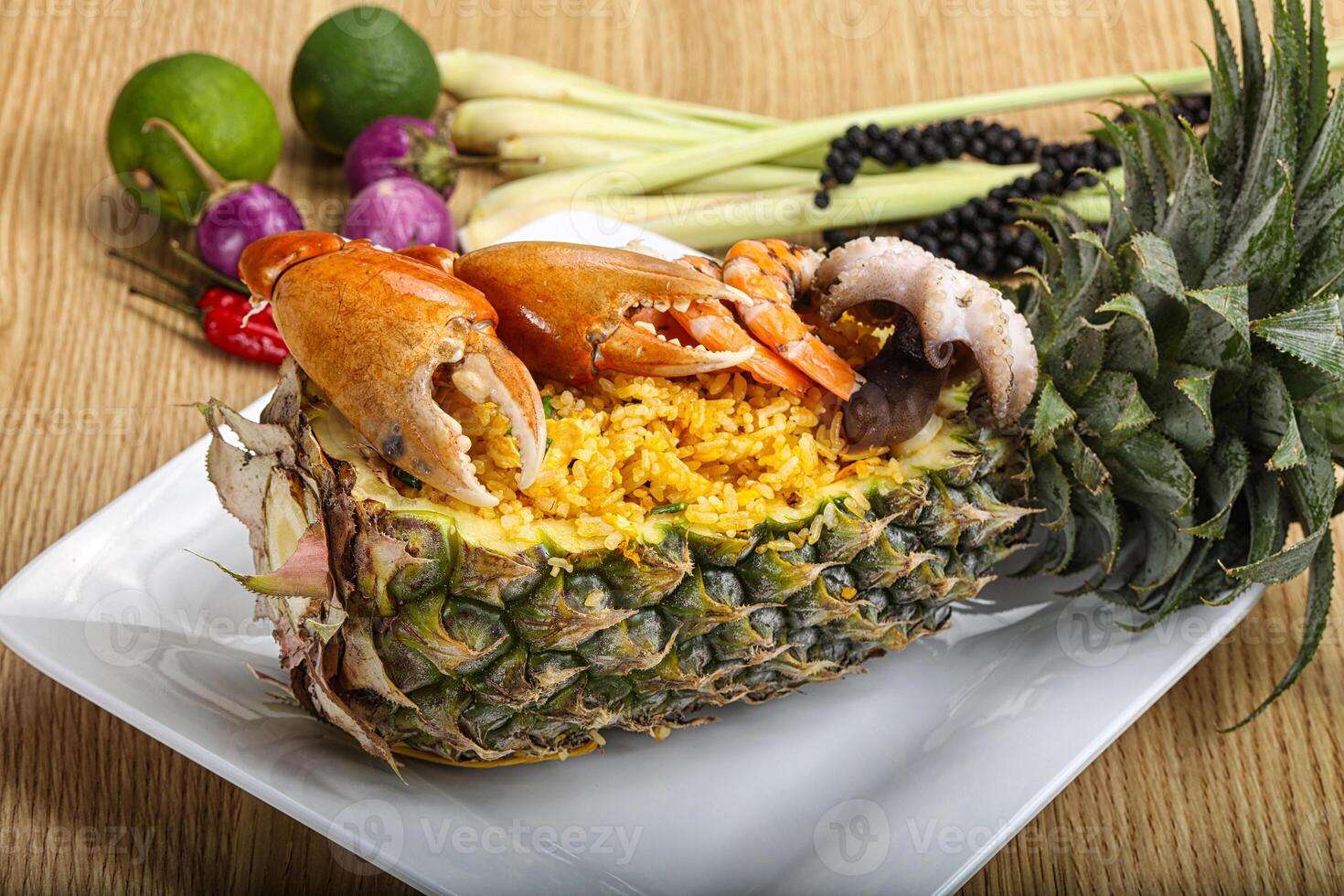 Rice with seafood in pineapple photo