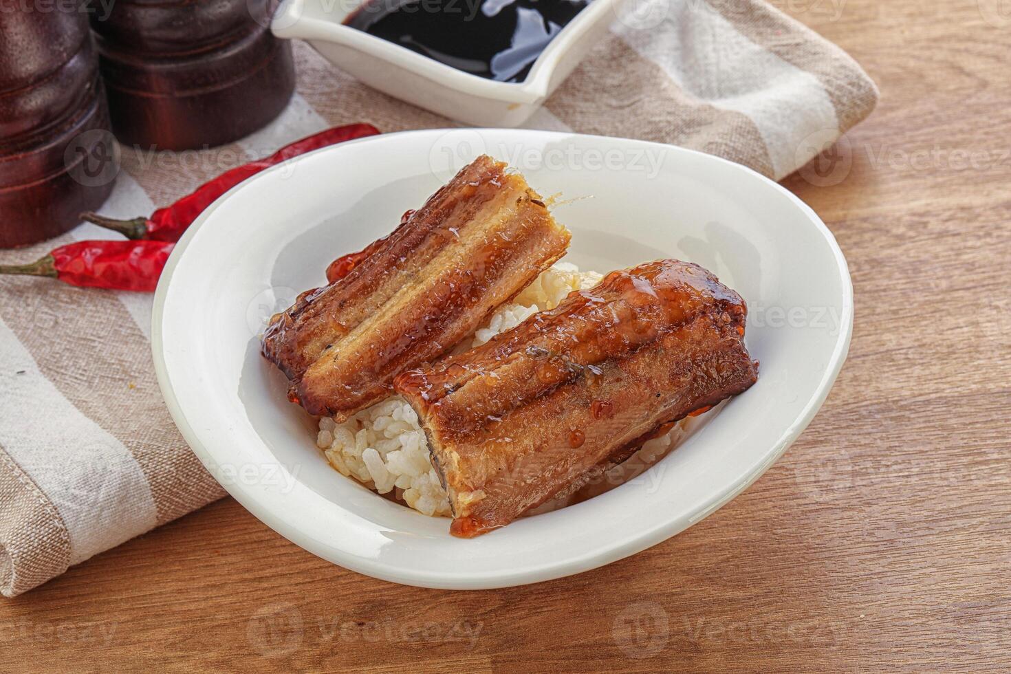 Roasred eel with steamed rice photo