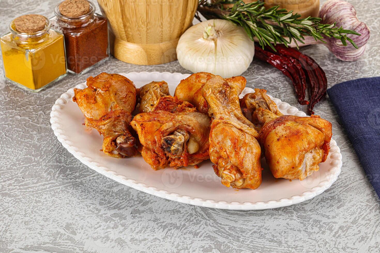 Raw marinated chicken drumstick for cooking photo