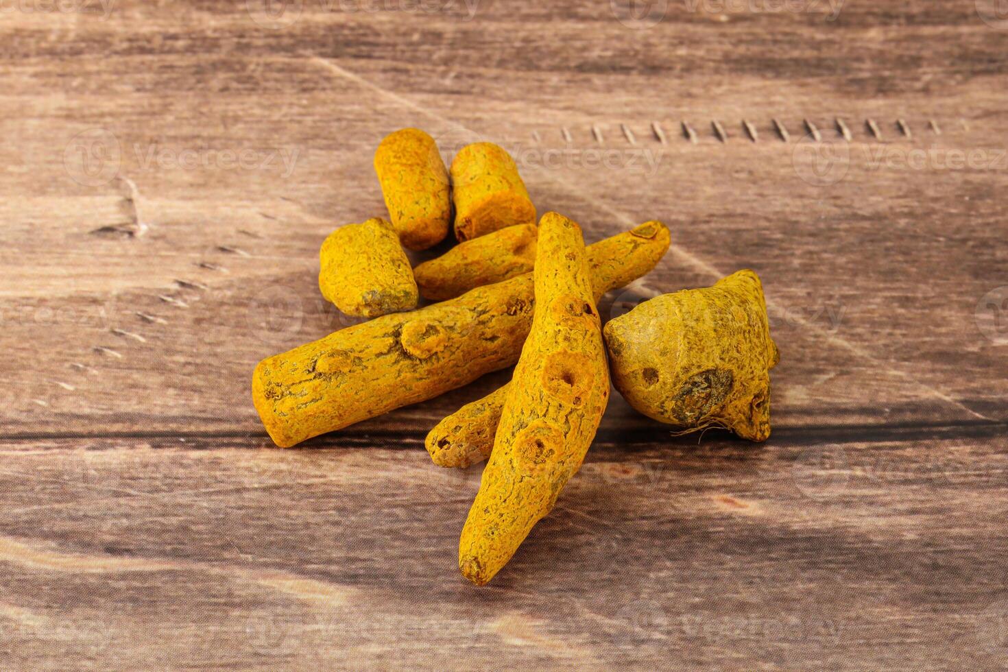 Indian spices - Turmeric root Curcuma photo