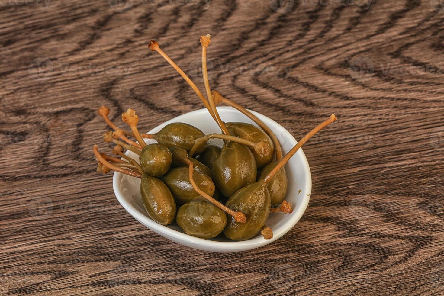 Caper berries in the bowl photo