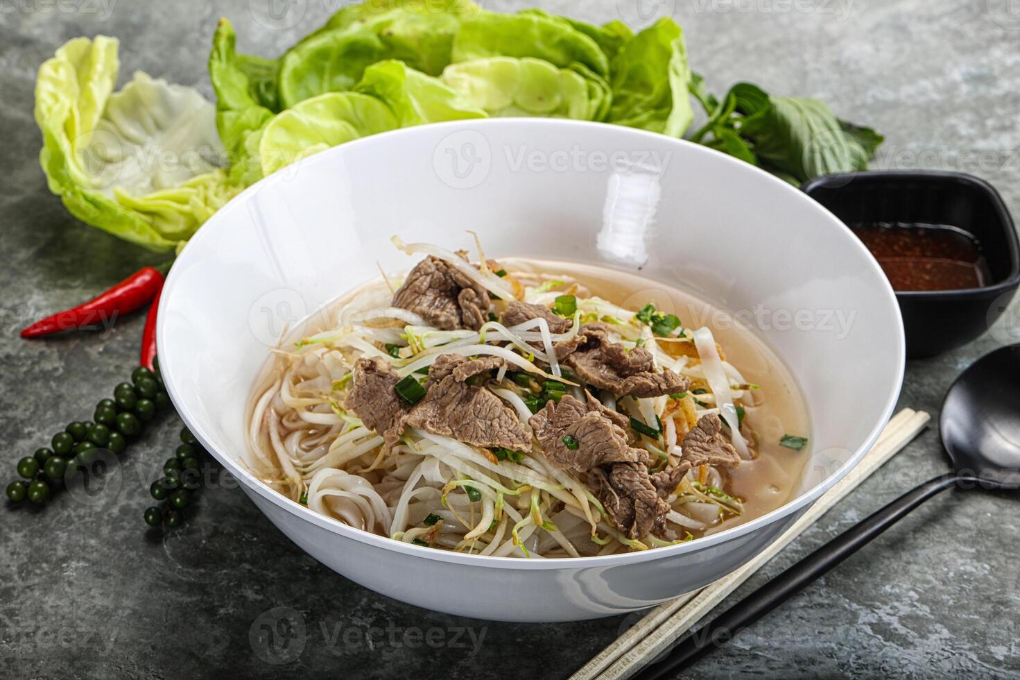 Vietnamese traditional soup Pho Bo with beef photo