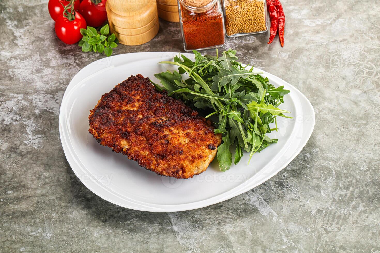 Tasty roasted breaded meat schnitzel photo