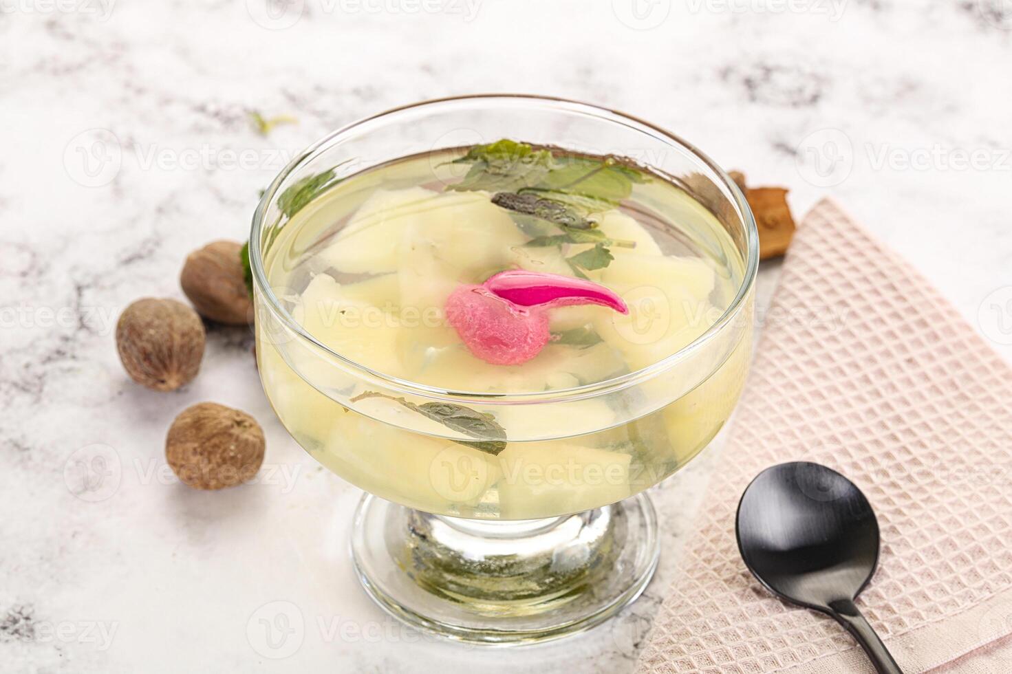 Sweet pineapple jelly with mint photo
