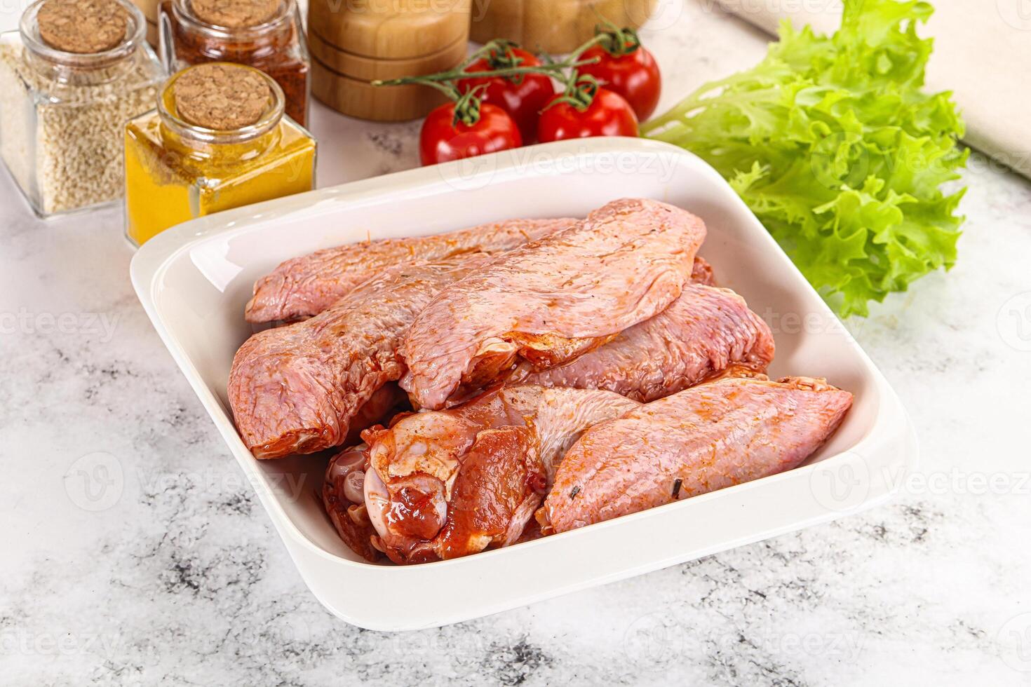 Marinated Duck wings for barbecue photo