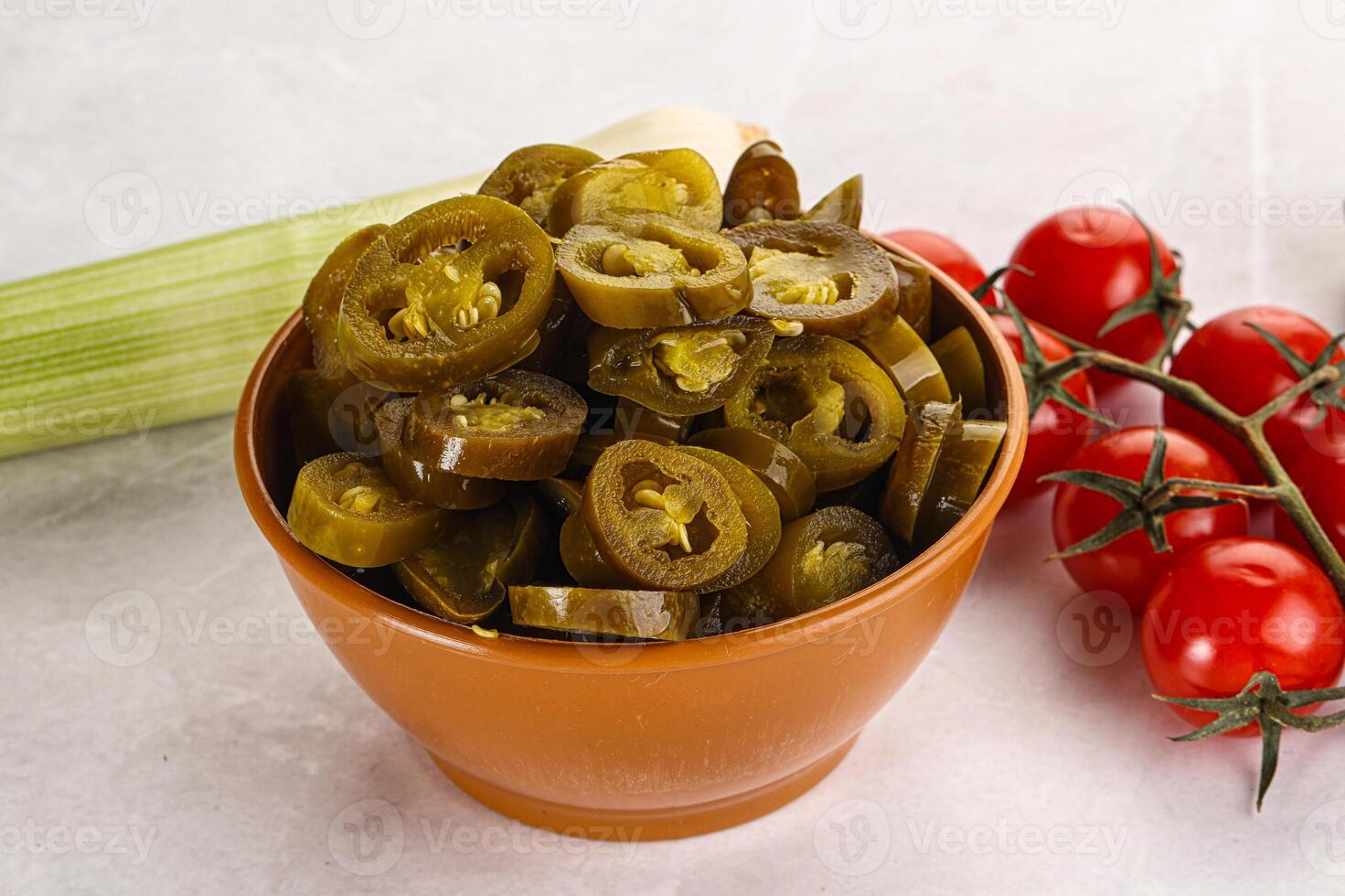 Sliced canned jalapeno pepper photo