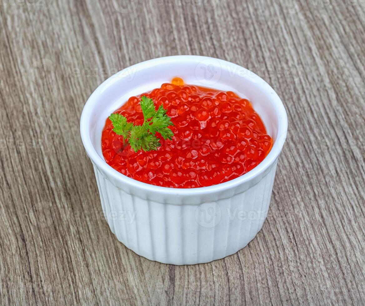 Red caviar in the bowl photo